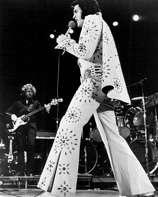 Wall Art - Photograph - Elvis Presley In White Outfit On Stage by Retro Images Archive